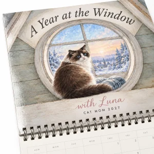 Close-up of the A Year at the Window Cat Mom Calendar print showing the cat's fur detail and wall calendar