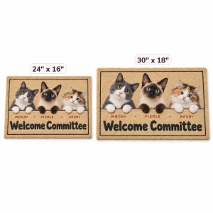 The Cat Welcome Committee Peeking Doormat in 24" x 16" and 30" x 18" sizes side by side
