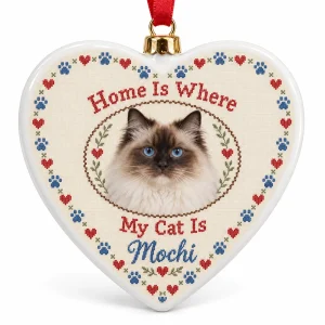 Cross-Stitch Heart Cat Lover Ornament with a seal-point Ragdoll and the text "Home Is Where My Cat Is", "Mochi", product photo on a white background