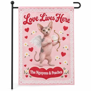 Valentine cat garden flag – Cupid Cat Valentine Garden Flag with a hairless Sphynx and the text "Love Lives Here", "The Nguyens & Peaches", product photo on a white background