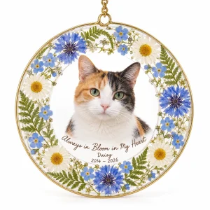 Cat memorial window hanging – Pressed Wildflower Cat Memorial Suncatcher with a calico and the text "Always in Bloom in My Heart", "Daisy", "2014 – 2026", product photo on a white background