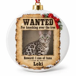 Funny cat christmas ornament – Santa's Most Wanted Cat Ornament with a sleek silver Bengal and the text "WANTED", "For knocking over the tree", "Reward: 1 can of tuna", product photo on a white background
