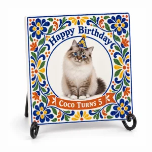 Cat birthday sign – Talavera Cat Birthday Ceramic Tile with a seal-lynx-point Birman and the text "Happy Birthday", "Coco Turns 5", product photo on a white background